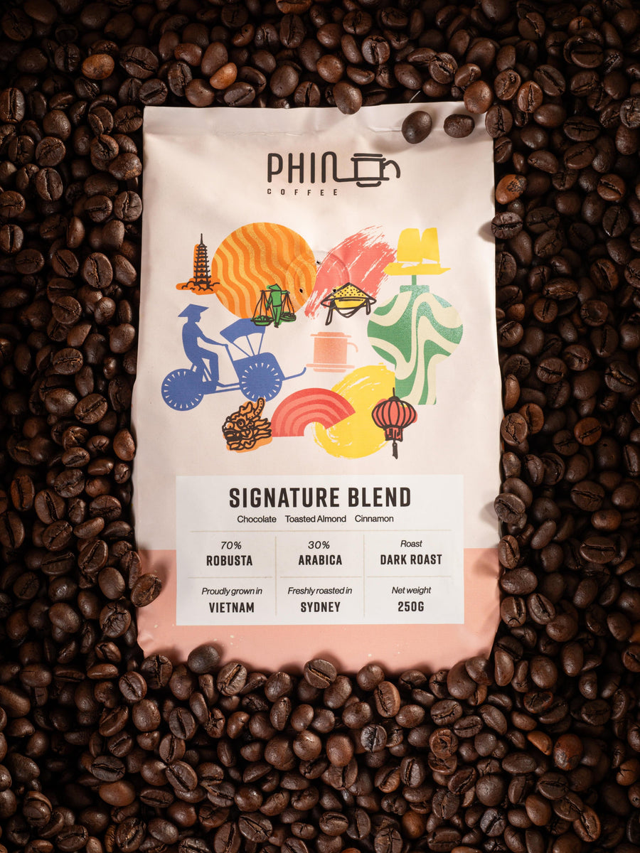 Phin Coffee Signature Blend 250 g bag of Vietnamese dark roast coffee on roasted coffee beans