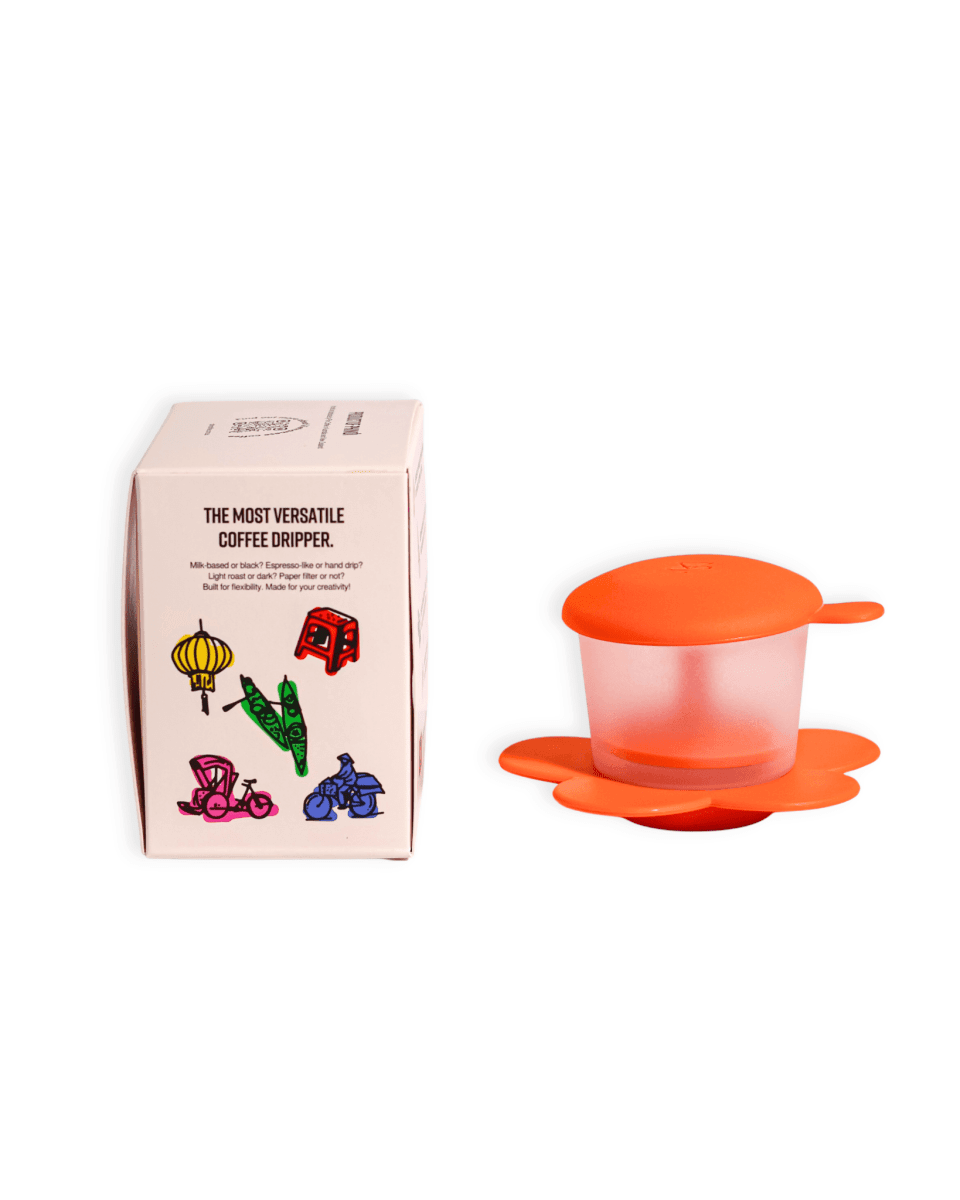 Vietnamese Phin Filter next to its packaging, designed for freshly roasted Vietnamese coffee lovers.