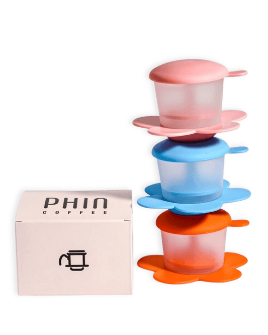 Transparent Phin Filter in colorful design, perfect for brewing freshly roasted Vietnamese coffee.