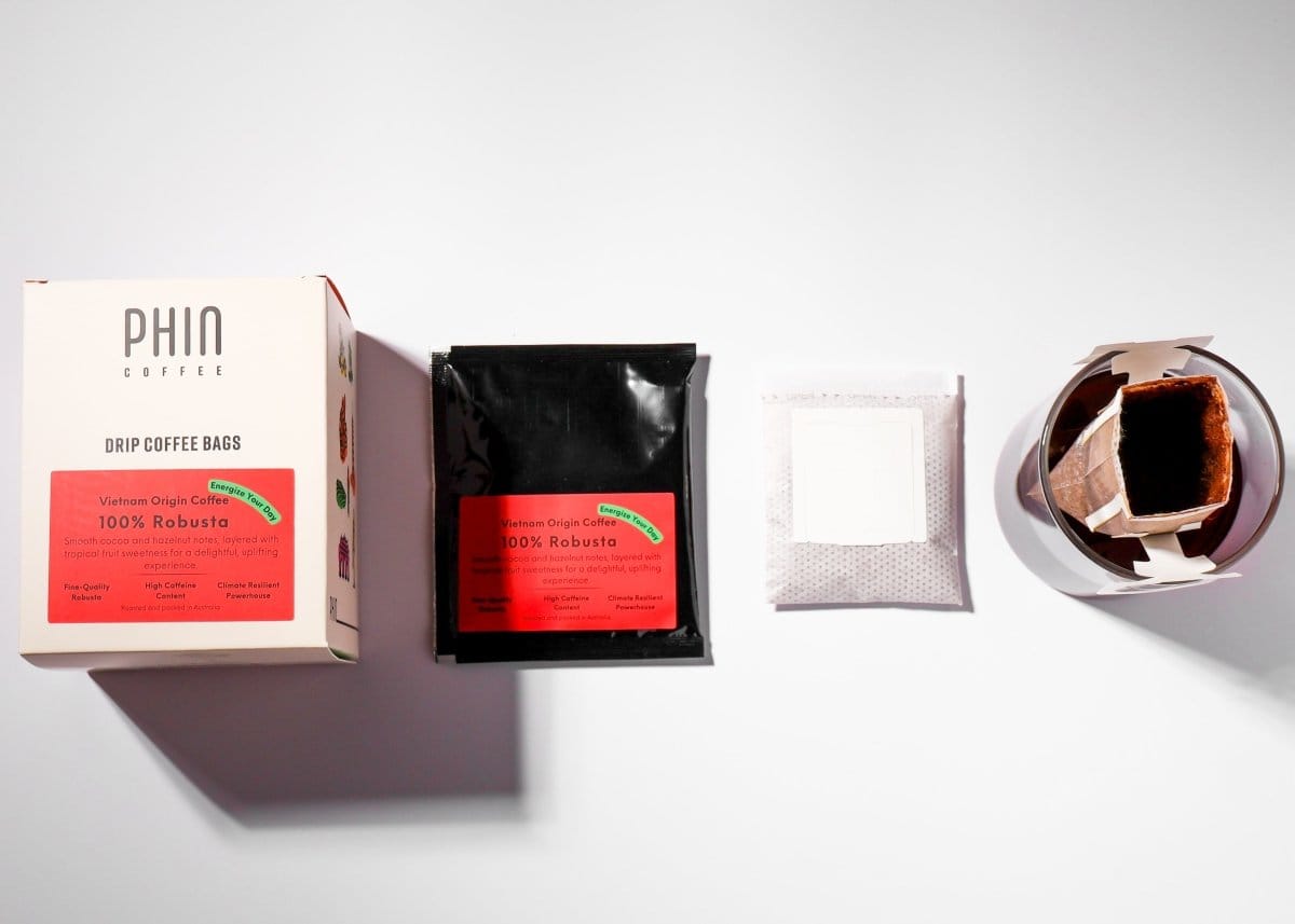 Single Origin Vietnam Robusta drip coffee bags packaging and pouches on a clean surface.